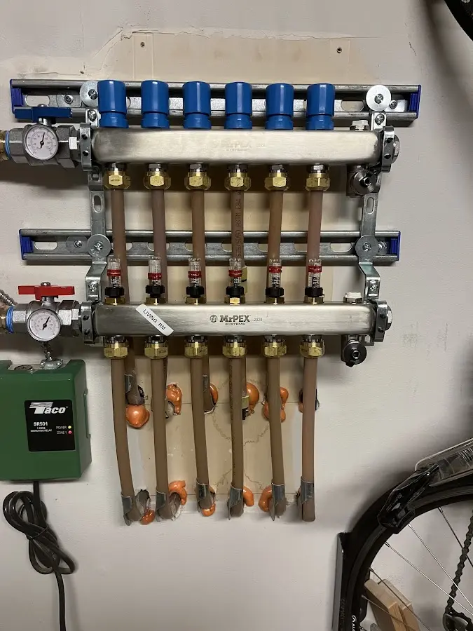 Plumber performing Water Heater Repair at a residential property in Parsippany-Troy Hills